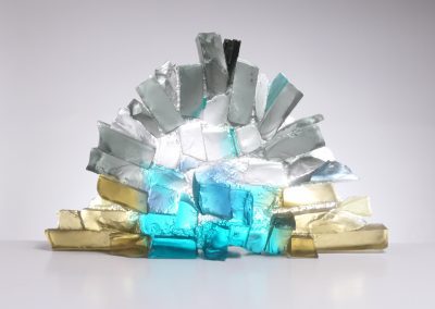 Glass sculpture in the form of a rocky wall