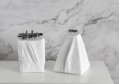 Two white glass sculptures by international glass artist Deborah Timperley