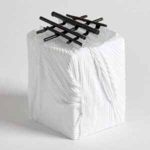 White rectangular box shaped sculpture with black grid on top by glass artist Deborah Timperley