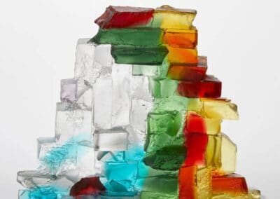 Handmade Art Glass Sculpture, (front view) inspired by light through a bridge by International Glass Maker Deborah Timperley