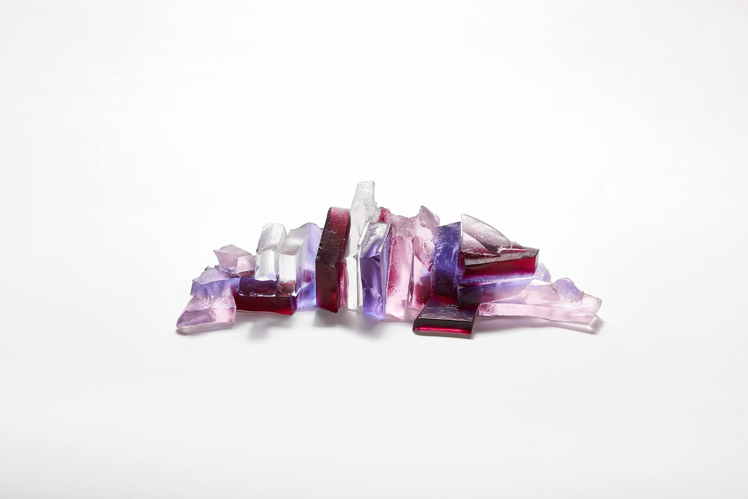 Glass sculpture art with purple and red glass shards, created by Deborah Timperley.