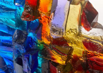 Vibrant abstract glass art with bold colours and textured surfaces, showcasing Deborah Timperley's c.